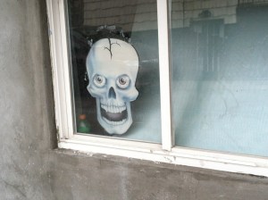 It was just before Halloween that the storm hit. This decoration still adorns a basement waiting for residents to return.